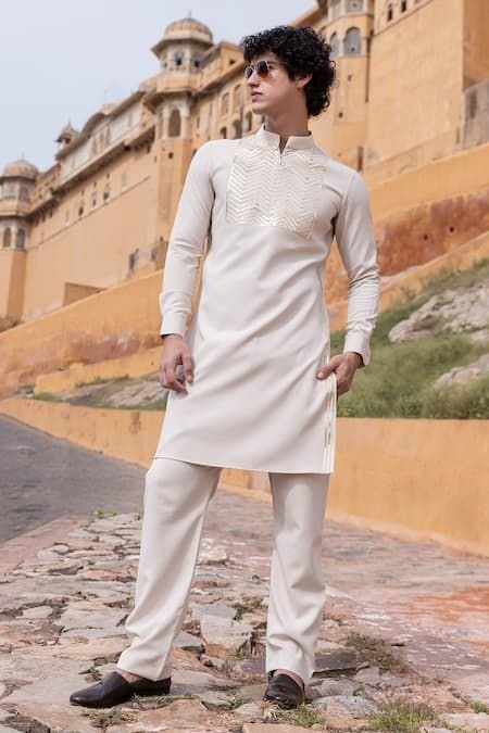 Buy Beige Poly Knit Tape Work Kurta With Aligadi Pant For Men by AMIT ARORA Online at Aza Fashions_